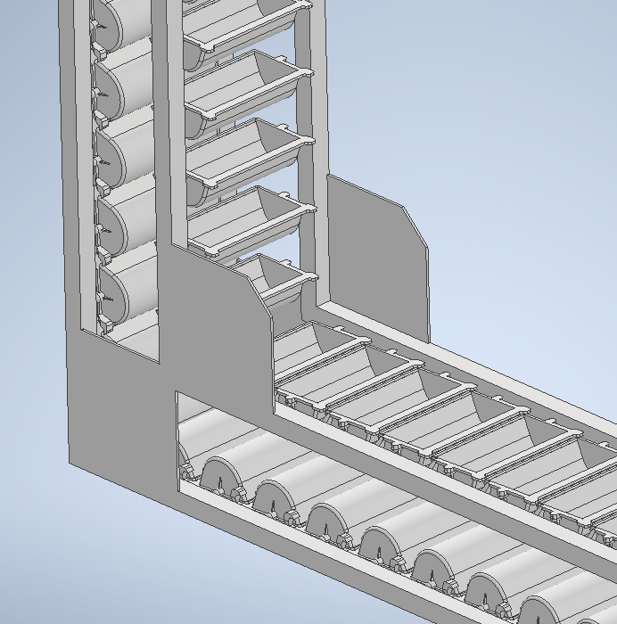 Autodesk Inventor CAD close-up of bucket elevator and conveyor detail for nut-kernel handling